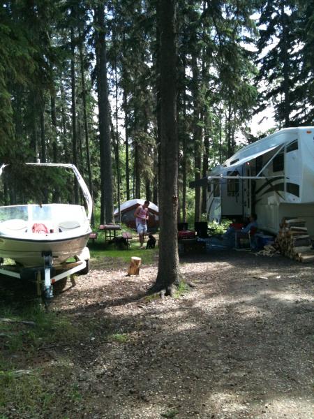 Hilliards Bay Provincial campground... kids with the tent and the boat