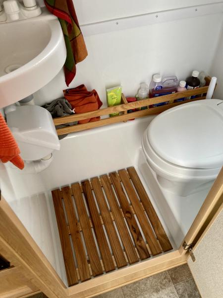 I added a teak bath mat to the shower.