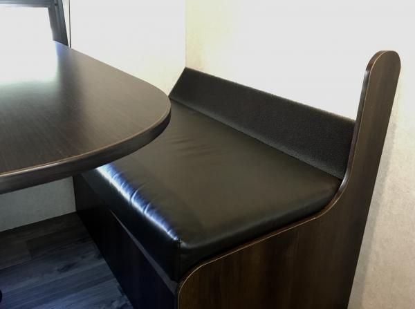 I cut a section of foam “Gutterstuff” to the width of the dinette seat. With the seat back in place, it doesn’t show and makes the angle more comforta