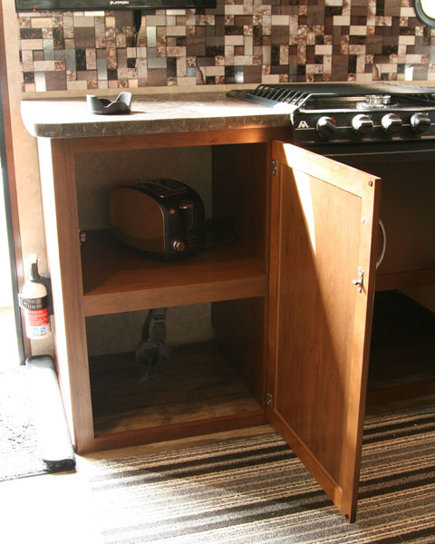 I removed the plywood divider in the lower cupboard to open up the usable space in the lower area.