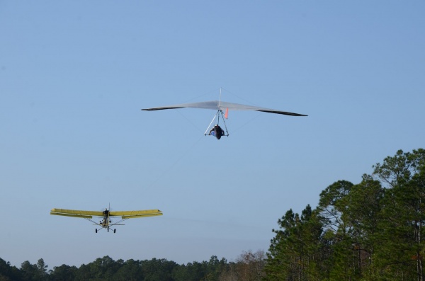 In Florida, towing up behind an ultralight aircraft.