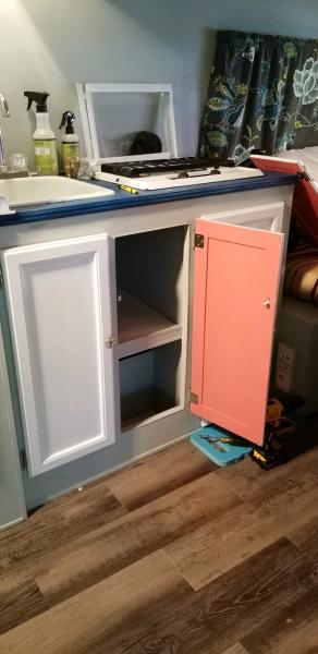 Inside cabinets...pop of coral