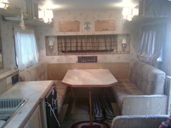 Inside kitchen dinette view taken from back of camper