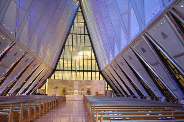 Inside the Air Force Academy cathedral looking toward the alter.  The glass at the back offers great views of the sky and clouds as a backdrop