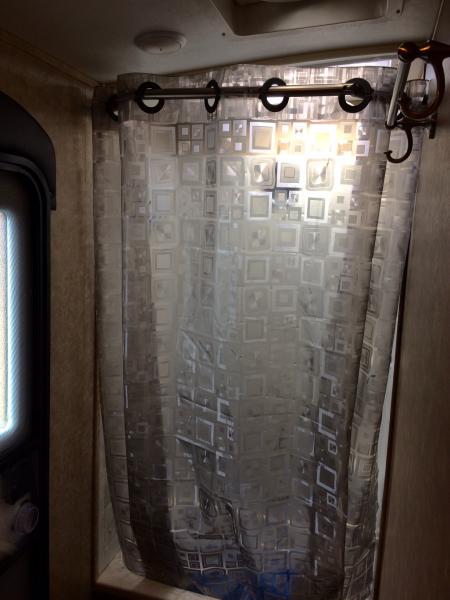 Installed a translucent shower curtain to let in more light but still feel somewhat private.