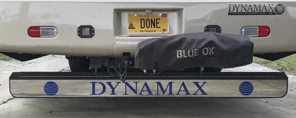 Installed blue vinyl wrap on inside of Dynamax name and emblems.