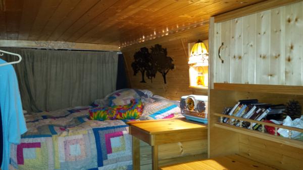 Interior of our GMC homemade camper van.