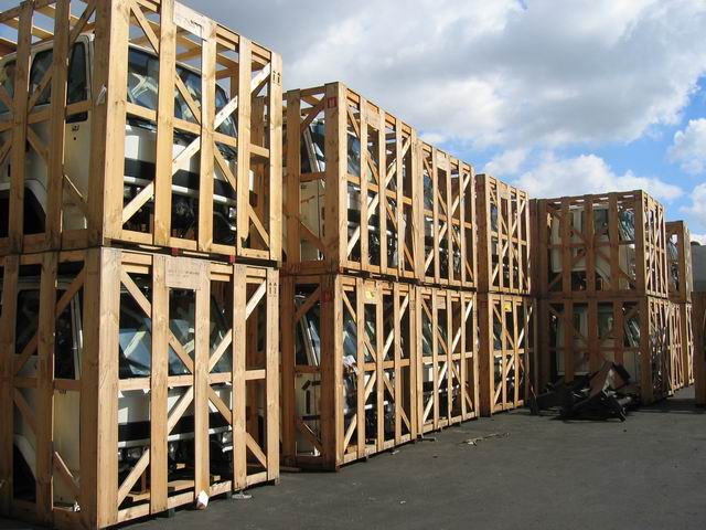 Isuzu Trucks in wood shipping crates