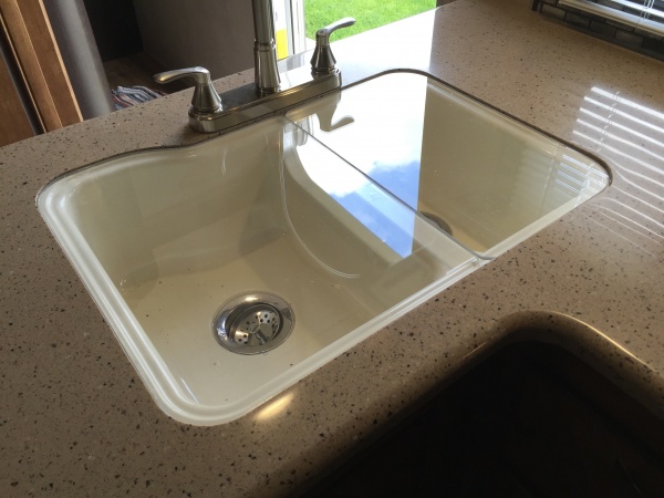 It did not come with covers for the sink, so I made some out of 1/4" plexiglass.  This is in 2 pieces so one side can be open.