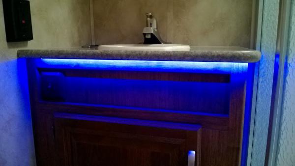 Led under counter top night light in bathroom.