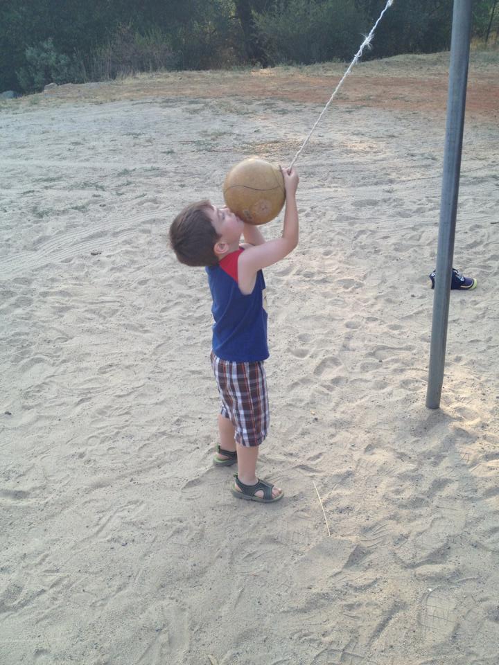 Little Ray playing with the tether ball