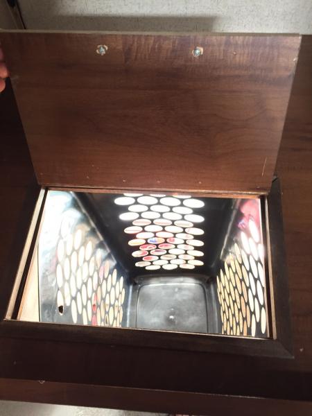 Looking into the clothes hamper with the storage door open underneath just for some light so I could take a better picture.