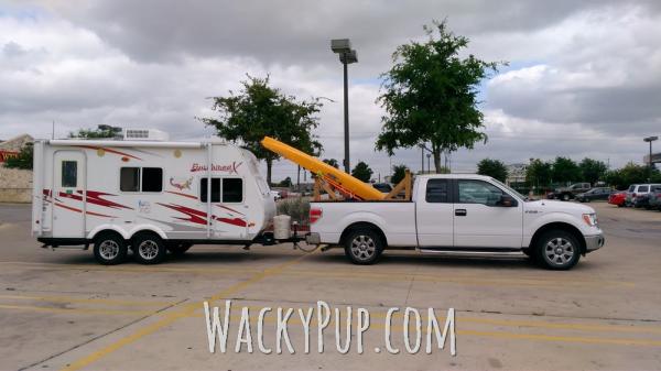 Love my little camper! It is shorter than our truck LOL. This is how we travel with our Hobie tandem kayak. Usually there's a couple bikes thrown in t