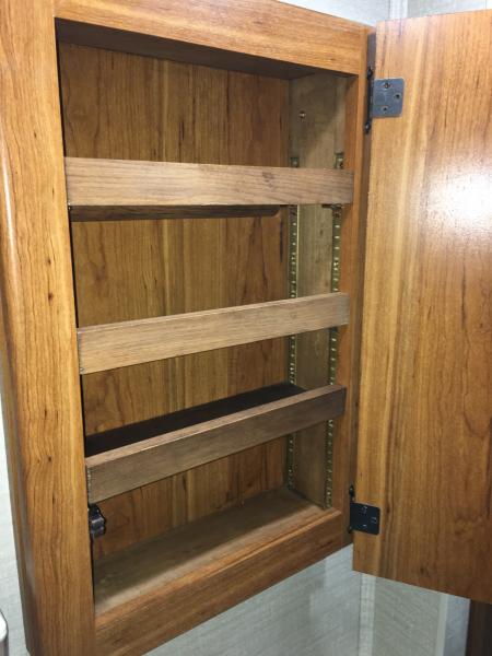 Made the medicine cabinet deeper and added adjustable shelves