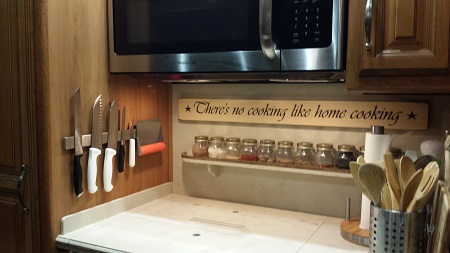 Magnetic knife rack in kitchen! Yay! I have missed this, no more cut fingers digging through utensil drawer! Thank you Todd! He used small metal hollo