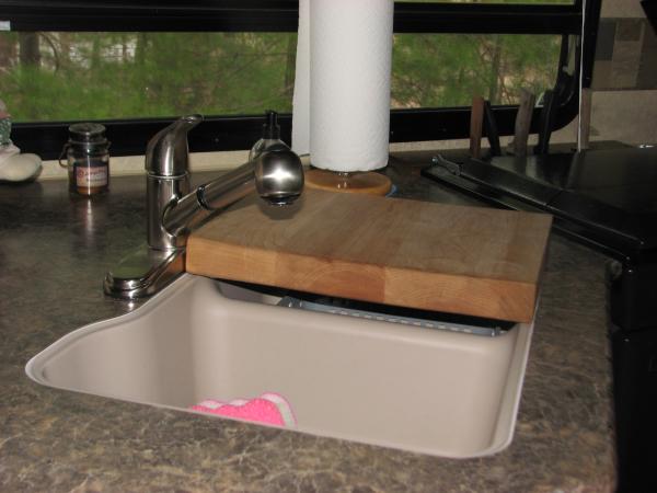 Maple cutting board made from some scraps of wood from our home kitchen island.