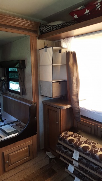 MODIFICATION: Added hanging cubbies for each bunk. We used those short hanging closet organizers you can find pretty much anywhere and screwed in two 