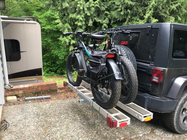 Modified Black Widow dual motorcycle rack to squeeze the bikes closer to the Jeep, and closer to each other. Reduced the rear hang distance by about 1