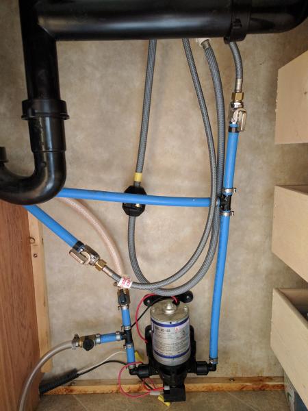 Modified plumbing, changed from 1/2" FIP that connected directly to faucet to 3/8" compression with valves to hookup to faucet.