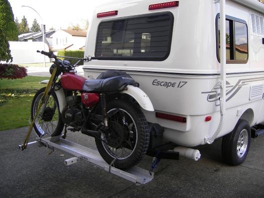 Motorcycle on motorcycle rack.