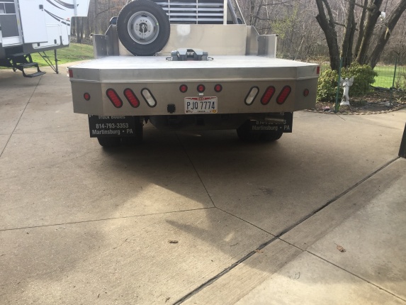 Moved the spare tire and installed the hitch plate.