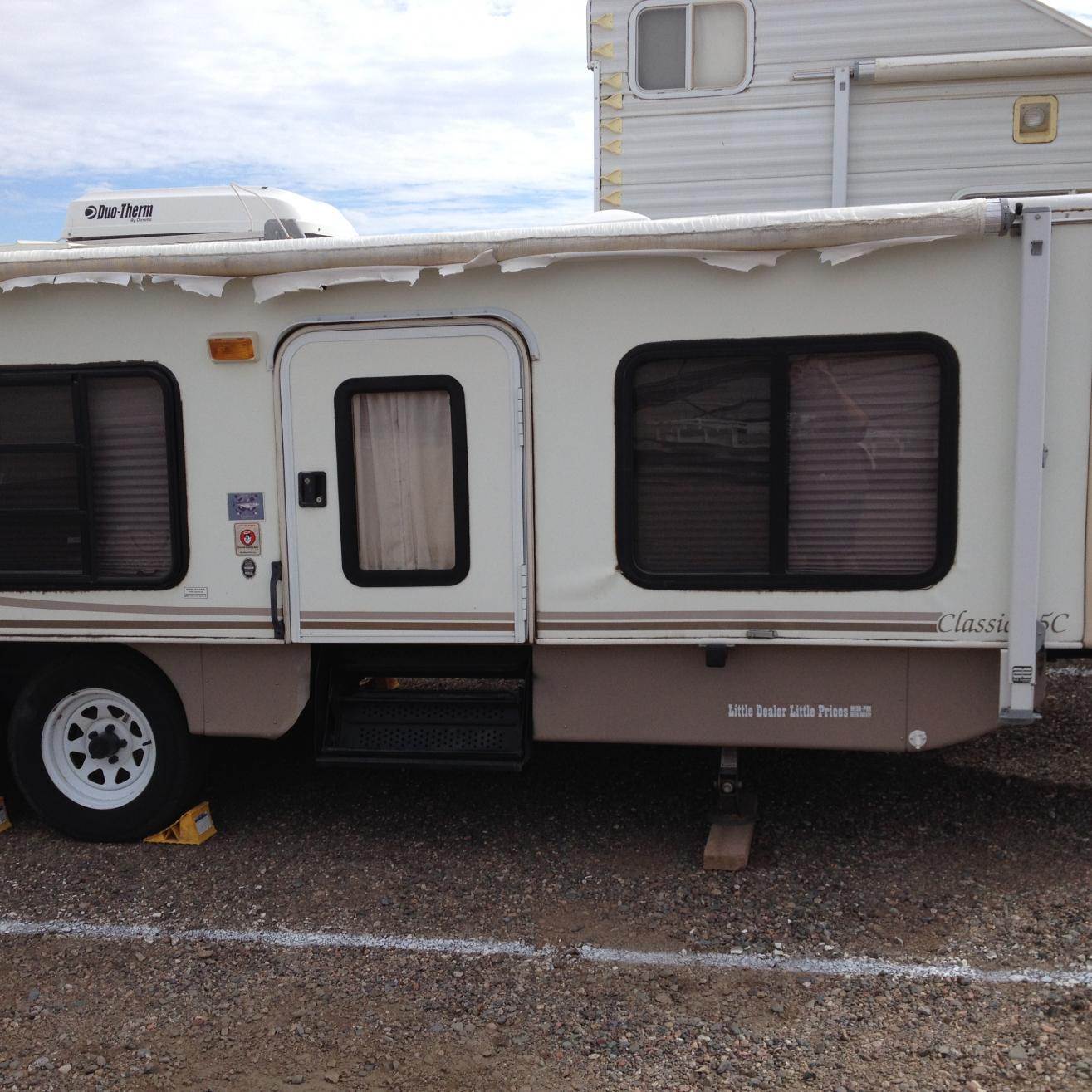 My 2005 HiLo Classic 25 after the Monsoon Storm at the storage facility with no cover on, it destroyed my Awning, I needed to get a New one anyway!