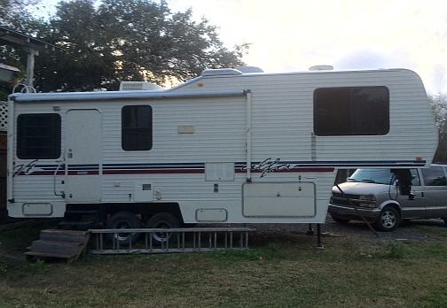 My second RV - a huge 5th wheel.  Did not like the stairs and closed off bedroom area.