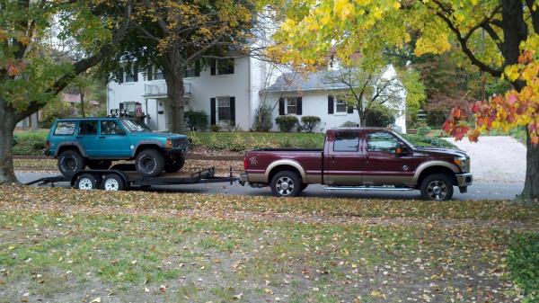 My Truck and Jeep on my trailer.