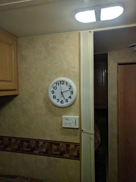 New clock with sweeping second hand, so no ticking in the middle of the night.