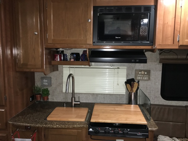 New Lippert brushed nickel pull-down style kitchen faucet in the Coachmen.  It was not pleasant to do dishes with the stock cramped-clearance faucet. 