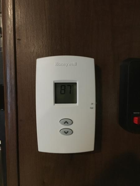 New Thermostat.

I had to use the batteries..  Tested hooking it up with just 12VDC, it didn't turn on.  Using the batteries, it turns on and controls