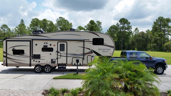 New truck and fifth wheel on street