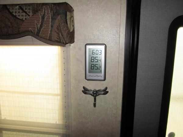 Not really a mod but like the looks of this hook to hold keys and put on an inside/outside thermometer next to the door.