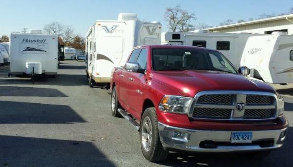 Nov 2011: trading in the 2008 Flagstaff 26 FS (on the left) and taking delivery on the 2012 V-Lite 30WFKSS