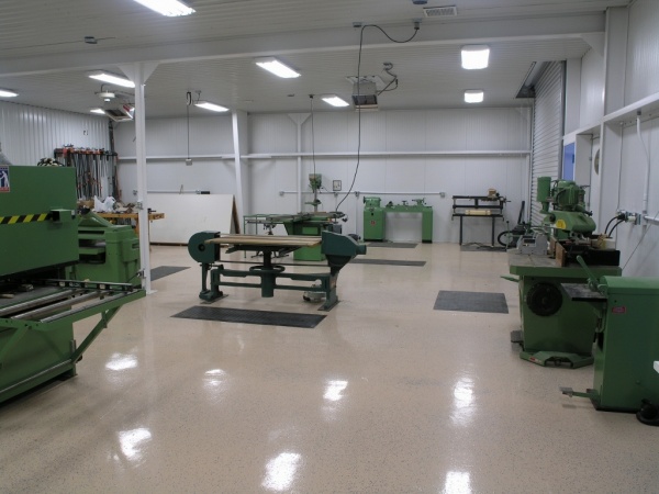 On the left 36” belt sander, toward the middle a stroke sander Oliver, on the right Rockwell 7.5hp shaper. In the back is a Yates American lathe and t