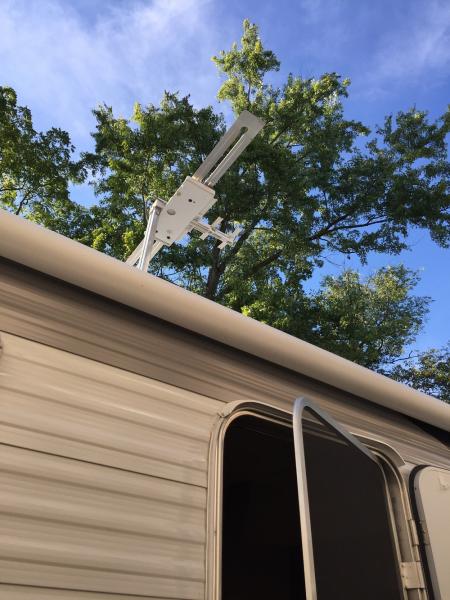 On the roof we mounted the Winegard Wingman and just sitting in our driveway we picked up 8 more tv stations. Not pictured is the MaxxAir 2 vent cover