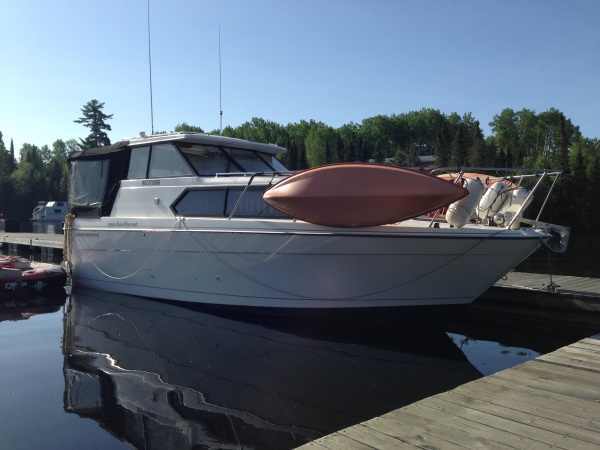 Our 30' cabin cruiser setup for 5 days on the hook. Many mods. We take 2 kayaks, peddle boat, tube and 14' fishing boat along. The TT is parked an hou