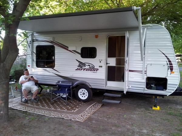 Our setup. I didn't realize I was close to the tree to open the awning all the way until after I uncouple the truck.