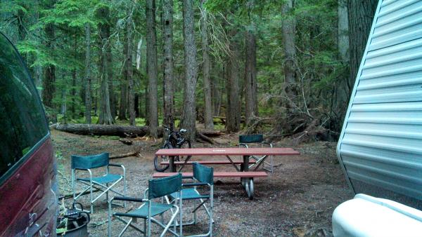 Our TT door opens to the picnic table and an endless cedar forest playground for the kids.  Love it!