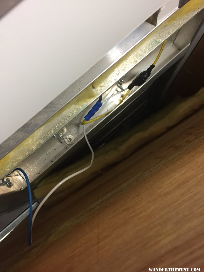 outside light power splice behind paneling