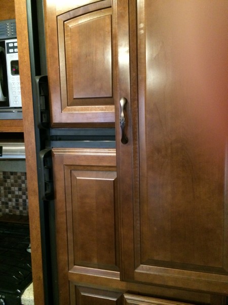 pantry 6.  Door opens in front of refrigerator.