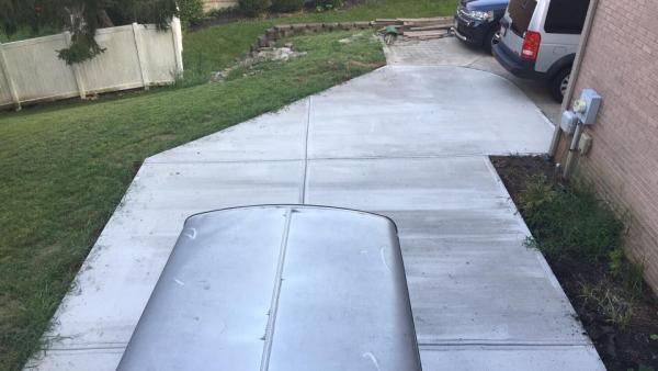 Parking the small box trailer on the slab 7 days after pour.