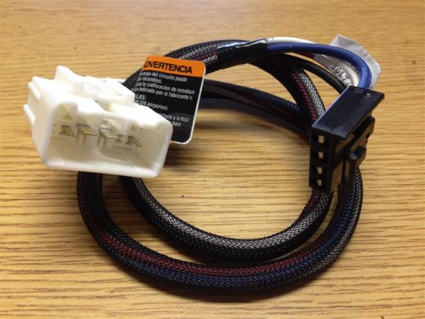 Plug and play cable for 2015 Tundra.  White connector plugs into Tundra factory harness and black connector into back of brake controller.  I purchase