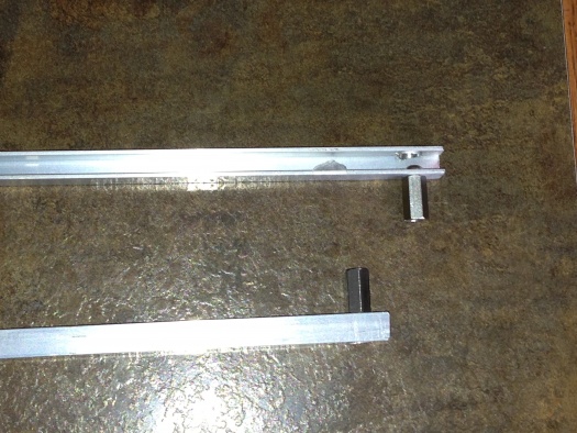 Raised rails used for mounting LED strips over step rug covers.  Joiner nut used as rail standoff.