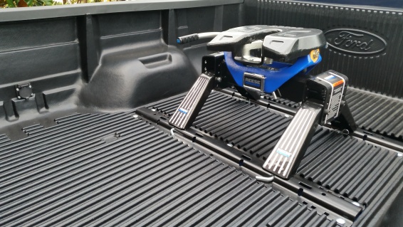 Reese Titan 16K install in F-250 with bedliner. Note the 7 pin connector installed through bedliner also