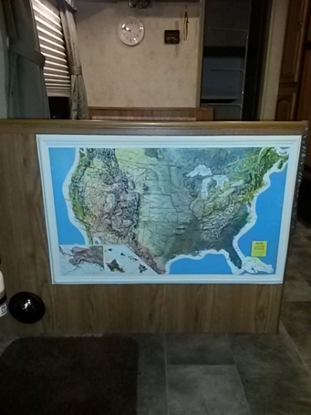 relief map of USA (this was mine - not included in camper purchase; it fits nicely in this area and protects the paneling in this high traffic area; t