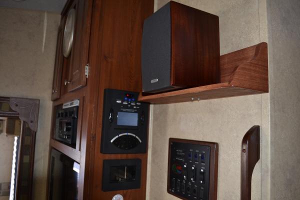 Relocated existing 12volt Soundsystem and Satellite Radio. Still fully function other than the surround sound rears.