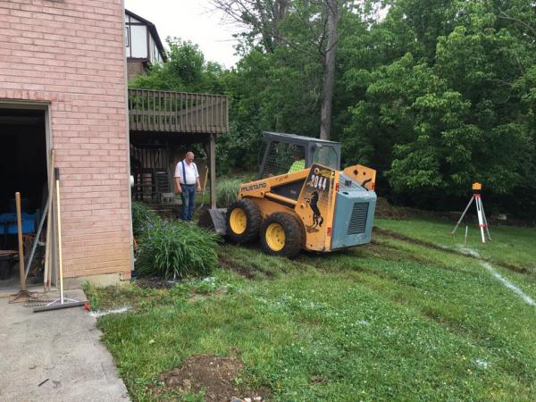 Rented bobcat to dig out the slab.