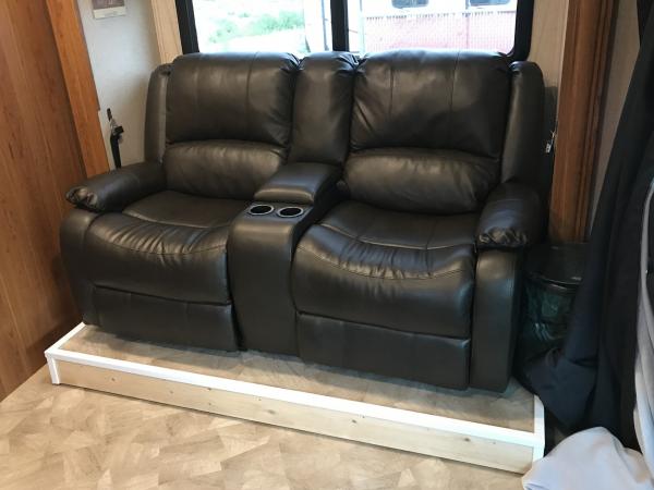 Replaced Dinette With - RecPro Charles 67" Double Recliner Sofa W/Console, Chestnut Color. Added wood around the platform since there was a 4" gap. Ma