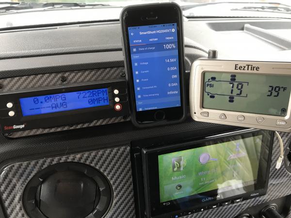 Replaced the tray and change holder with my handmade gadget holder. Sure beats them being all over the dash. My RVI TOAD breaking monitor mounts below